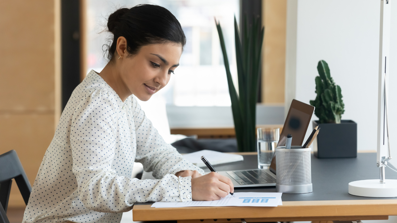 Back Office Executive working on computer